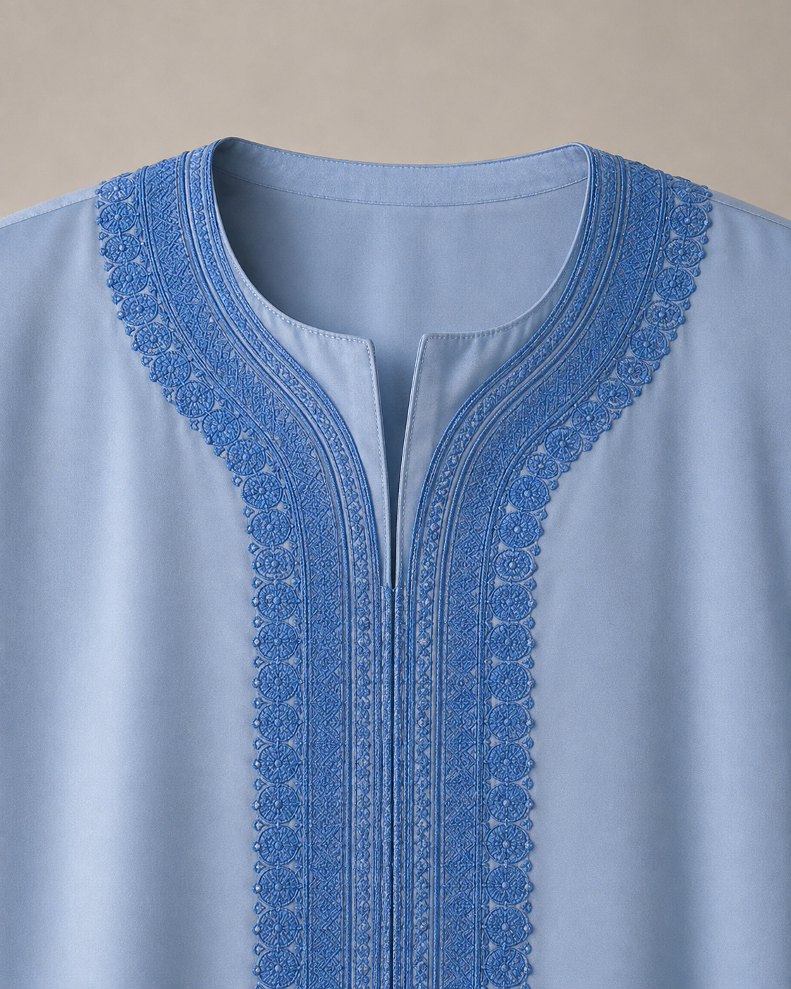 Light blue Moroccan jubba embroidered neckline close-up