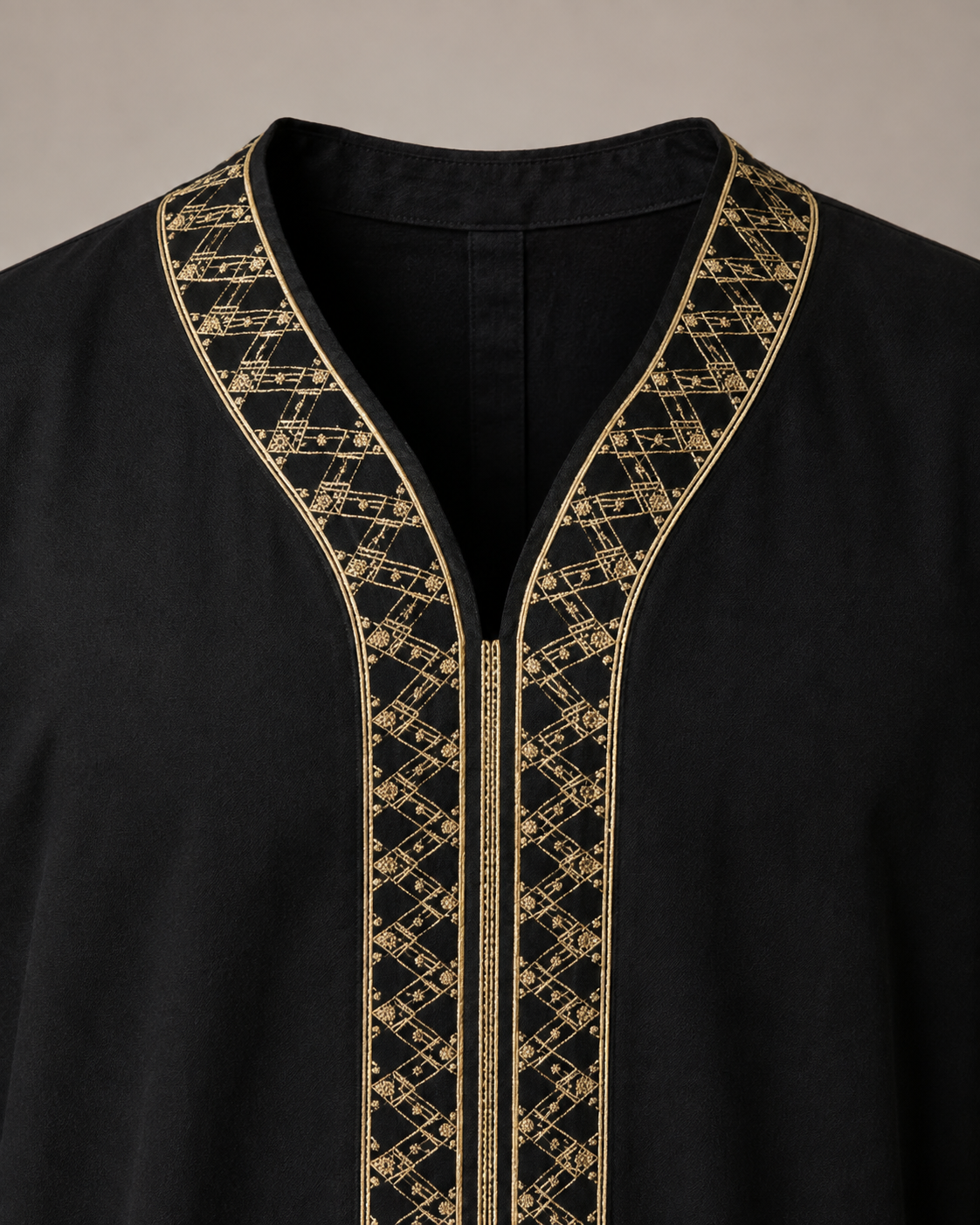 Black Moroccan jubba geometric embroidered neckline close-up