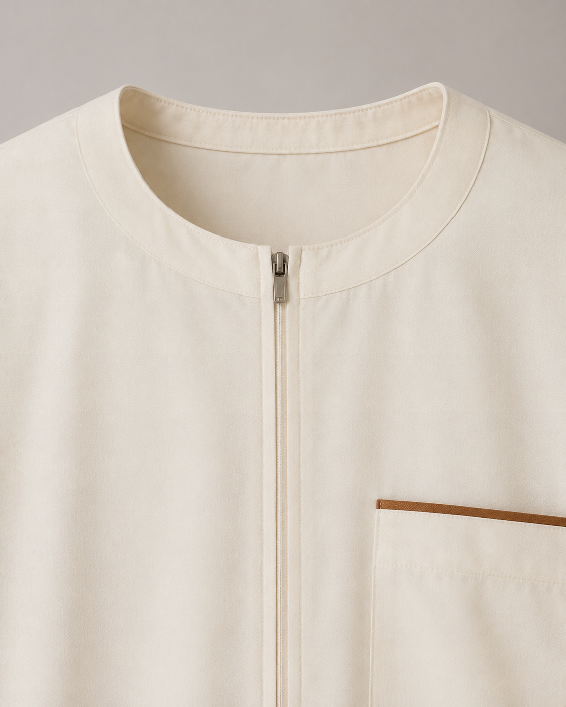 Ivory Moroccan jubba neckline and chest pocket close-up